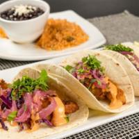 Los Cabos · Three beer-battered fish tacos, red cabbage, pickled red onion, chipotle aiöli. Served with ...