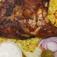 Half Chicken · Half grill chicken serve with rice and salad tsaziki sauces on the side