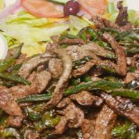 Kebda (Beef Liver) · Serve with rice and salad tsaziki sauces on the side