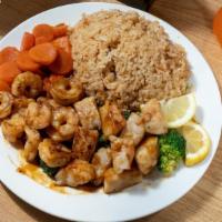 Shrimp & Scallop · Served with fried rice zucchini mushroom and onions.