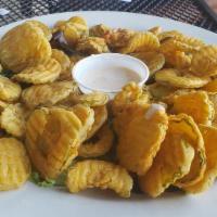 Southern Fried Pickles · Breaded pickle chips deep fried and served with our spicy ranch dressing.