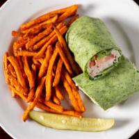 Turkey Avocado Wrap · Our sliced turkey breast, with bacon, Swiss, lettuce, tomatoes, sliced avocado and ranch dre...