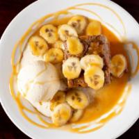 Bananas Foster · Sautéed bananas in a buttery, bourbon rum sauce, smothered over our homemade bread pudding w...