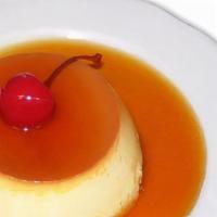 Flan · A smooth Mexican custard topped with a delicious creamy caramel sauce. A classic favorite!