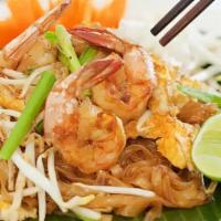 Pad Thai · Stir-fried rice noodles with pad Thai sauce, egg, bean sprouts, green onion and crushed pean...