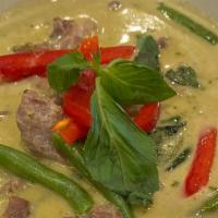 Green Curry · Thai green curry with bell peppers, basil, green beans and cabbage.