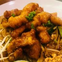 Pad Thai Crispy Chicken  · Deep Fried Crunchy Chicken in Pad Thai Sauce with Rice Noodles, Egg, Bean Sprouts, Green Oni...