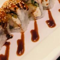 Tiger Roll · Shrimp tempura, cucumber and cream cheese topped with shrimp.