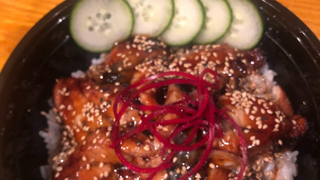 Unagi Don · BBQ eel over sushi rice.