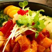 Poke Don · Mixed veggies, seaweed salad, spicy variety of fish over sushi rice.