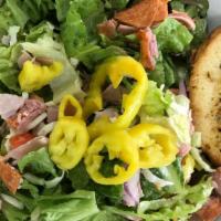 Antipasto Salad · Spring mix, fresh mozzarella, pepperoni, black olives, tomatoes, cucumber and artichoke with...