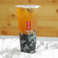 Qq Passionfruit Green Tea · Includes Black Pearls and Coconut Jelly