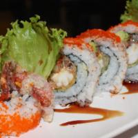 Spider Roll · Tempura soft shell crab, cucumber, avocado with lettuce and masago.