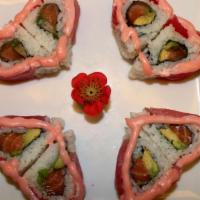 Sweet Heart Roll · Salmon, avocado inside, topped with tuna and special sauce.