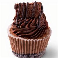 Fudge Brownie Cheesecake · Chocolate chip cheesecake topped with chocolate buttercream, rich ganache, chocolate morsels...