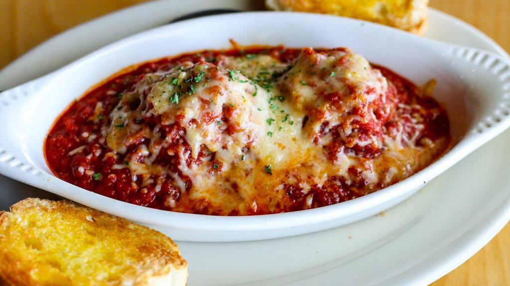 Meatballs · A homemade blend of beef, pork, and veal topped with Marinara, sprinkled with shredded parmesan and served with garlic bread.