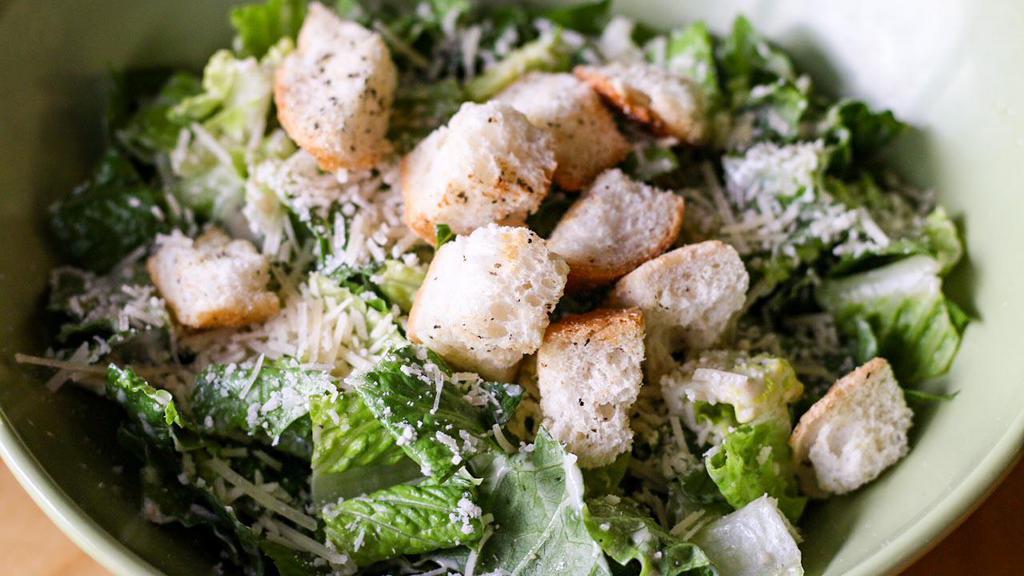 The Caesar · Romaine, croutons and Parmesan cheese tossed in Caesar dressing.