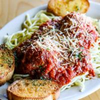 Spaghetti & Meatballs · A homemade blend of beef, pork, and veal topped with marinara, sprinkled with shredded Parme...