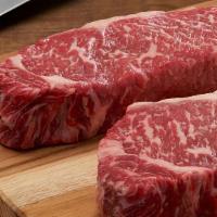 Fresh Aged Center Cut Ny Strip (12 Oz.) · 28 days wet aged, center cut and thick cut with plenty of marbling for incredible tenderness...