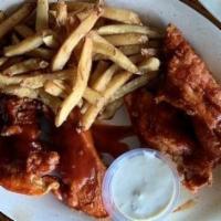 Buffalo Tenders · Chicken tenders hand-battered and covered in your choice of sauce, served with dill ranch or...