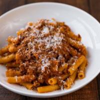 Bolognese · Slow-cooked rich meat sauce, Maccherone pasta, Parmigiano Reggiano