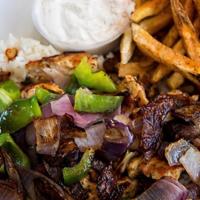 Chicken Souvlaki Dinner · This dish is served with pita bread, side Greek salad, fries and a side of tzatziki with chi...
