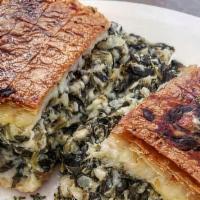 Spanakopita Dinner · This entrée is served with pita bread and a side Greek salad and a piece of homemade Spanako...