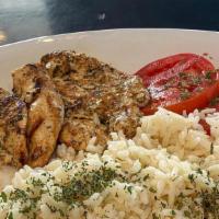 Lemon Herb Chicken Dinner · This platter is served with pita bread, tzatziki, side Greek salad and fries and chicken wit...