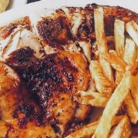 Half Chicken Dinner · This platter is served with pita bread, side Greek salad and fries and a half chicken.
