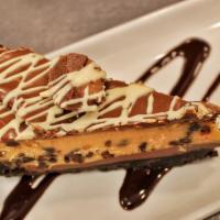 Peanut Butter Pie · Oreo crust, peanut butter mousse, chocolate drizzle, and whipped cream.