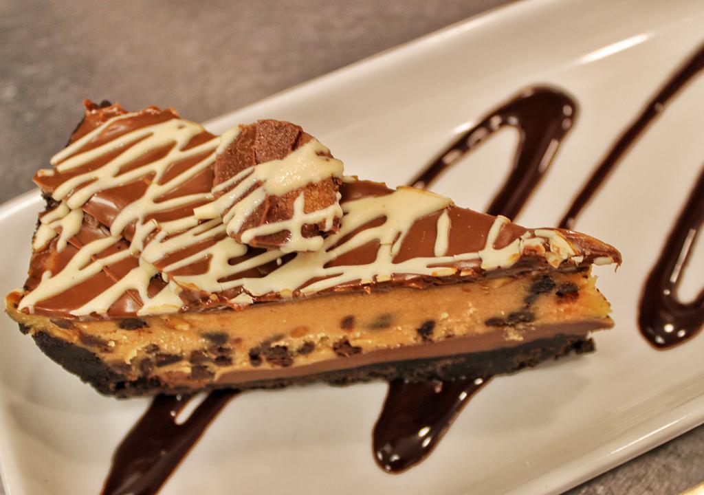 Peanut Butter Pie · Oreo crust, peanut butter mousse, chocolate drizzle, and whipped cream.