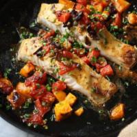 Sea Bass Fillet & Shrimp  · Fresh seasoned Sea bass fillet with Lobster sauce, Sautéed vegetables, grilled shrimp with s...