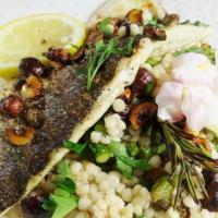 Branzino Fillet With Couscous  · Fresh Branzino Fillet, Lime Greek Herbs, Kalamata Olives, Couscous. Served with two sides of...