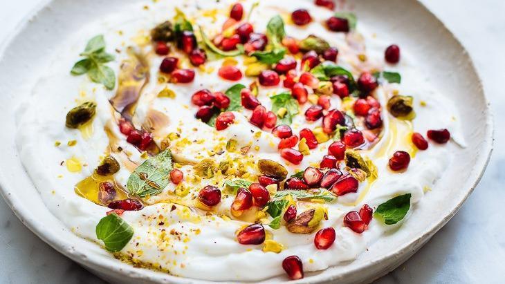 Labneh · Thick strained Greek yogurt prepared with garlic and olive oil.