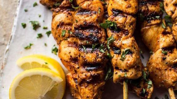 Chicken Kebab · two skewer of Tender chunks of chicken breast marinated with a blend of seasonings and charbroiled.  Served with two sides of your choice of hummus+pita bread or salad or rice