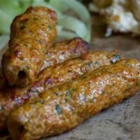 Chicken Kofta · two skewer of Ground chicken marinated with Cleo's unique blend of herbs and spices. Served ...