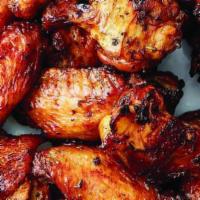 Chicken Wings Platter · Grilled chicken wings 5/6 jumbo with our special blend of seasonings and garlic sauce.  Serv...