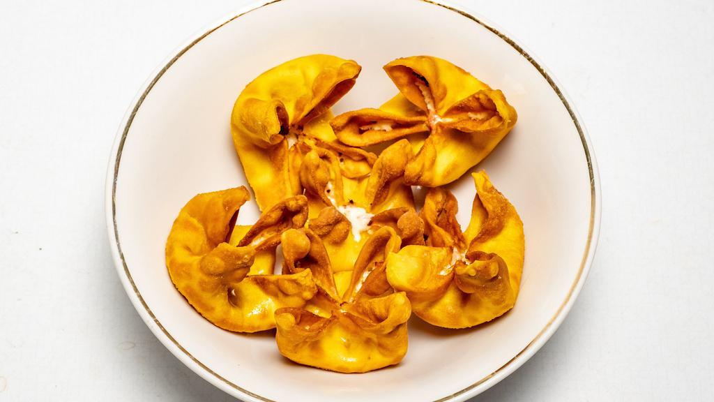 Crab Rangoon (6Pc) · Six pieces. Cream cheese, Crab meat, Pinch of onion, With special Sauce.