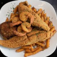 Queen Michelle'S Seafood Bliss · Choose deep fried or pan seared fish - 7 oz Whiting, Tilapia or Catfish, with 4 colossal shr...