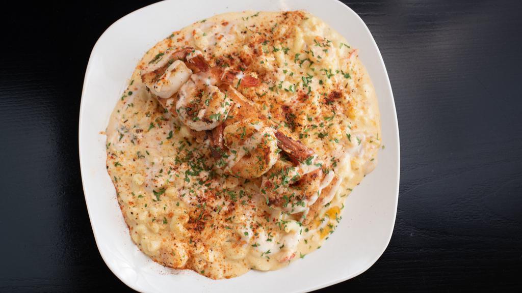 Tenille'S Seafood Mac N Cheese · Lump crab, lobster and shrimp baked in 5 cheese mac. Topped with jumbo garlic butter pan seared or deep fried shrimp and your choice of deep fried or pan seared catfish, whiting or tilapia.