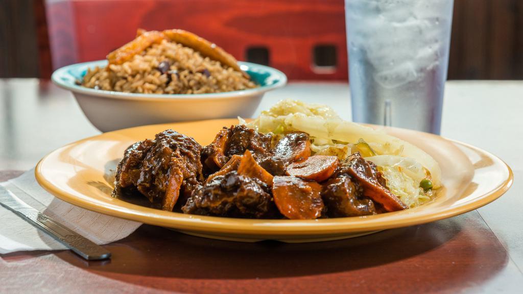 Large Oxtails · Entrees are served with choice of rice and fried plantains. (without substitution)