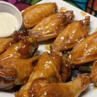 Wings · Eight naked wings with choice of wing flavor, served with a side of ranch or bleu cheese.