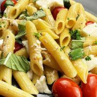 Margherita Pasta · Penne pasta, tomatoes, fresh mozzarella, Greek seasoning,  and basil tossed in garlic sauce....