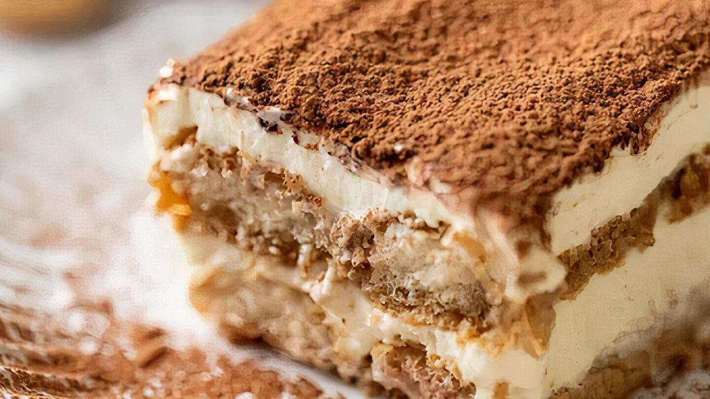 Tiramisu · A classic Italiandessert with a rich coffee flavor, creamy whipped filling and decadent cocoa topping.