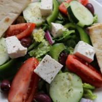 Traditional Greek Salata · Romaine lettuce, tomatoes, red onions, cucumbers, green peppers, kalamata olives and feta to...