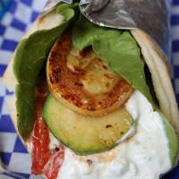Vegetarian Pita · Grilled eggplant, yellow squash, roasted red peppers served in a pita with romaine and tzatz...