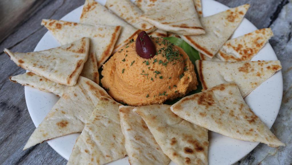 Hummus · Our freshly-made hummus is served with toasted pita wedges. Hummus flavors change weekly.