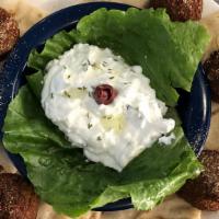 Falafel Appetizer · Six pieces of falafel served with pita and house-made tzatziki.