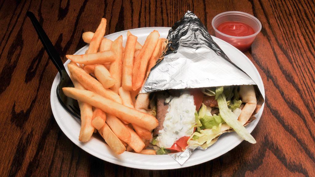 Kafta Gyro Combo · Fresh ground beef parsley, onions, spices, in a hot pita with lettuce tom and tzatziki. Served with Fries and Drink.