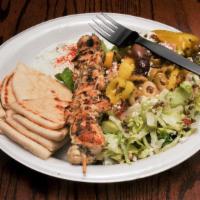 Chicken Kabob Plate · One juicy chicken kabob, plus one side of your choice. Homemade tzatziki and hot pita includ...